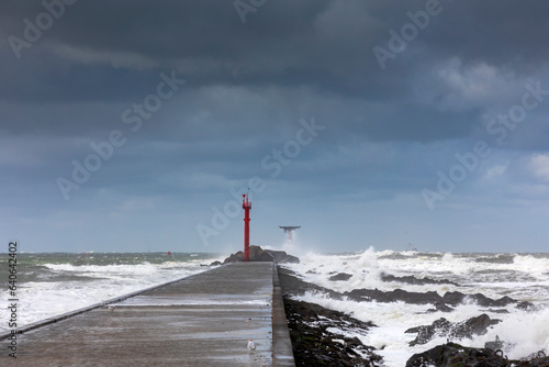 Stormy weather at the pier of Hoek van Holland, a seaside and port town along the Dutch coast near Rotterdam; Hoek van Holland, Netherlands