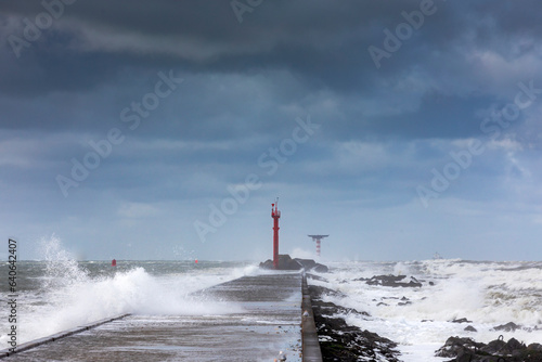 Stormy weather at the pier of Hoek van Holland, a seaside and port town along the Dutch coast near Rotterdam; Hoek van Holland, Netherlands