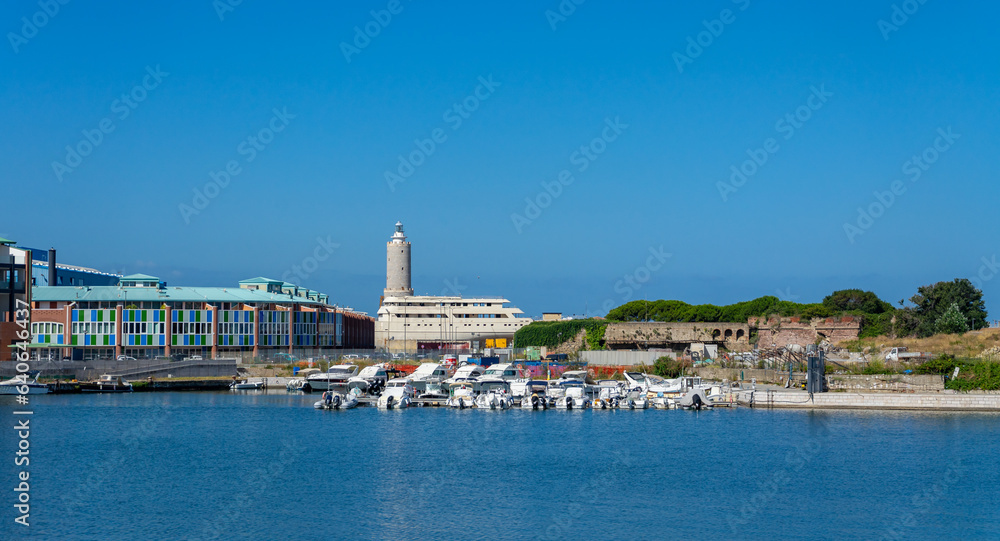 view of the port with lighthouse in livorno, italy