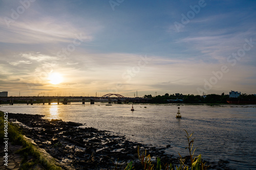Sunset silhouettes on Binh Trieu bridge in Ho Chi Minh City