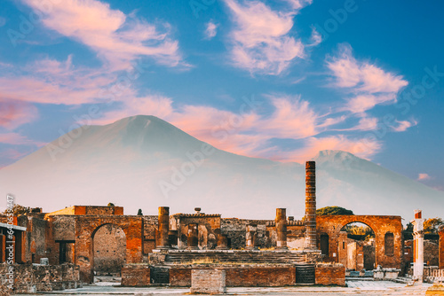 Pompeii, Italy. Temple Of Jupiter Or Capitolium Or Temple Of Capitoline Triad On Background Of Mount Vesuvius.