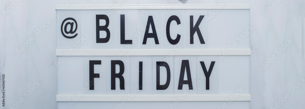 Black friday word on lightbox on white table. Black friday word on lightbox on white table.