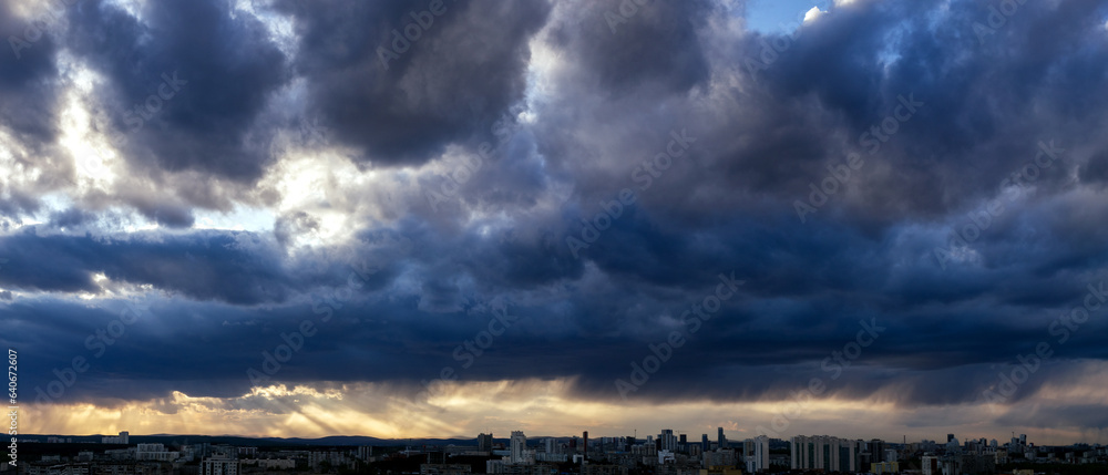 Dawn clouds over the metropolis of early winter sunset Dawn clouds over the metropolis of early winter sunset