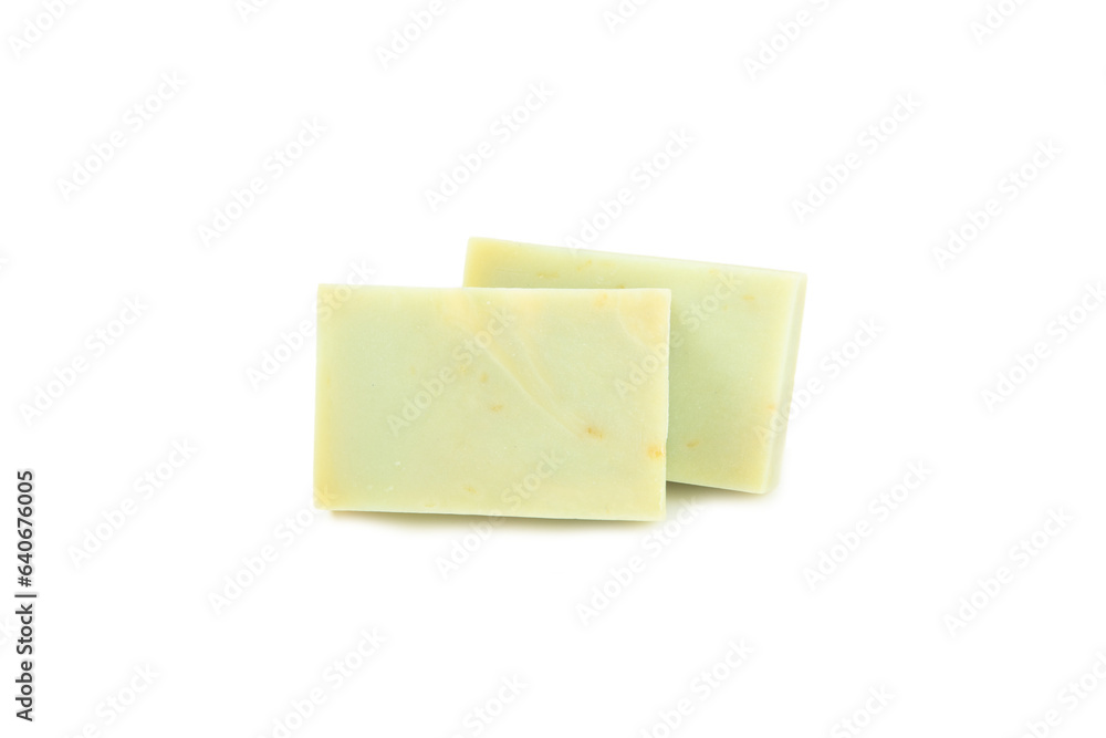 Natural bar of soap with olive oil extract isolated on white background. Pieces of green soap on a white background. Natural bar of soap with olive oil extract isolated on white background. Pieces of green soap on a white background.