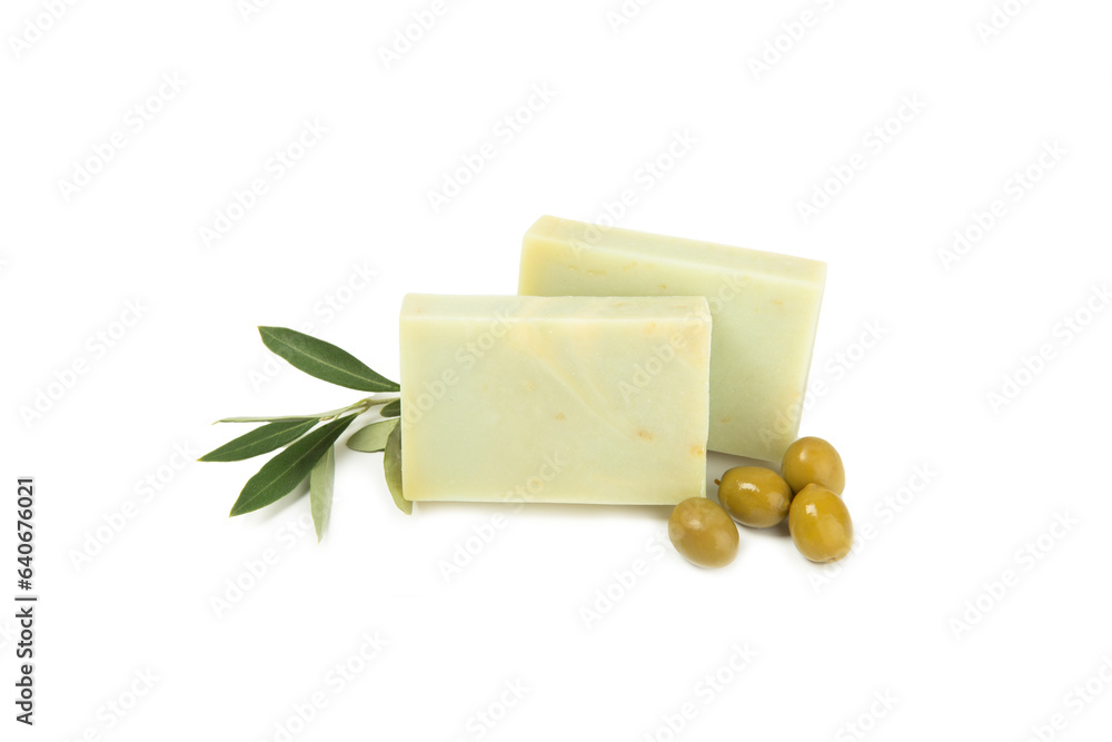 Natural bar of soap with olive oil extract isolated on white background. Pieces of green soap on a white background. Natural bar of soap with olive oil extract isolated on white background. Pieces of green soap on a white background.