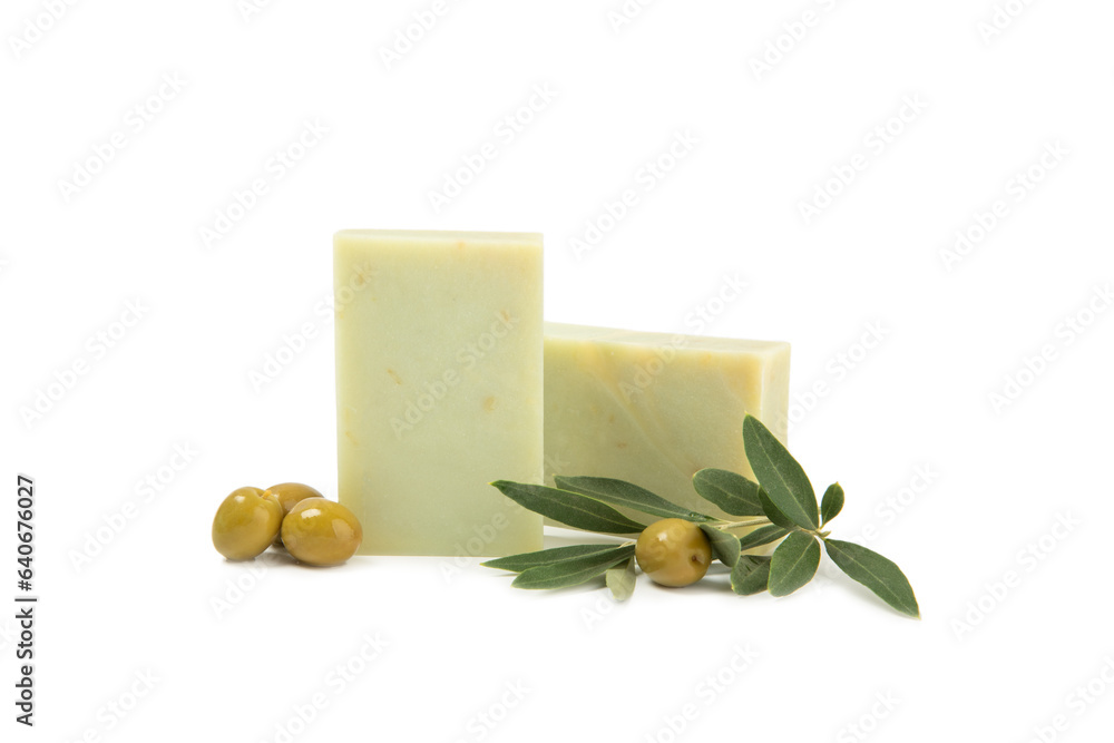 Natural bar of soap with olive oil extract isolated on white background. Pieces of green soap on a white background. Natural bar of soap with olive oil extract isolated on white background. Pieces of green soap on a white background.
