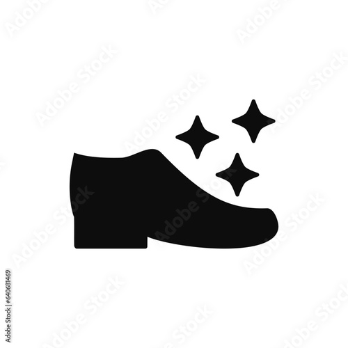 Shoe care and clean. Boot and sparkling stars with glitter.  photo