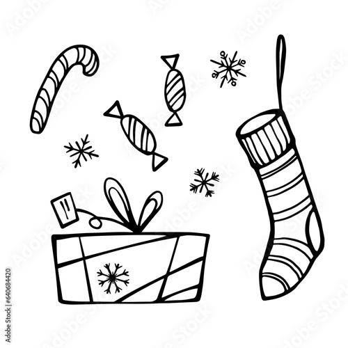 Black and white doodle set of Christmas stockings, gift box and candy. Vector design elements.