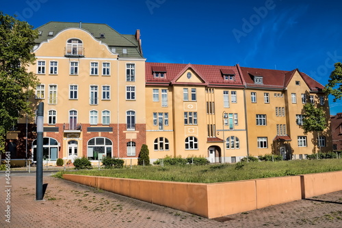 zossen, deutschland - sanierte häuserzeile am bahnhofsplatz photo