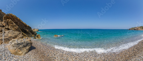 Fototapeta Naklejka Na Ścianę i Meble -  Rocky beach Geropotamos near Rethymno, island of Crete, Mediterranean Sea, Greece (Panorama)