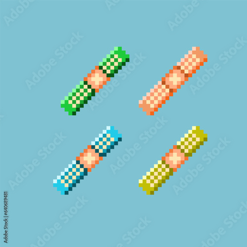 Pixel art sets of bandage for medicine health items. green,brown,blue,and yellow bandages on pixelated style.8bits perfect for game asset or design asset element for your game design asset.