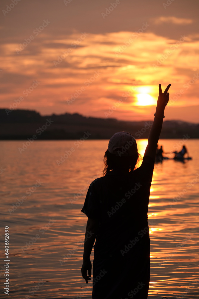 Silhouette of a person on a sunset