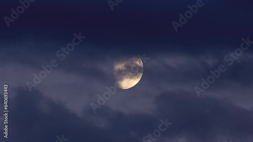 moving clouds on the background of the moon