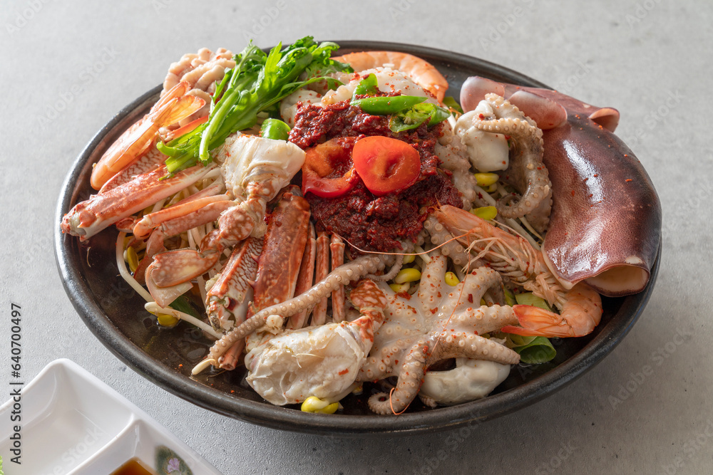 Steamed monkfish, steamed seafood, seafood stew, octopus hot pot Korean food dish Steamed monkfish, steamed seafood, seafood stew, octopus hot pot Korean food dish