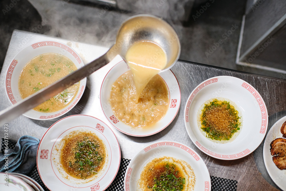 Process of serving delicious soup on table Process of serving delicious soup on table