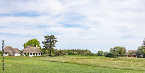 Landscape with old farm house at Langeland Denmark