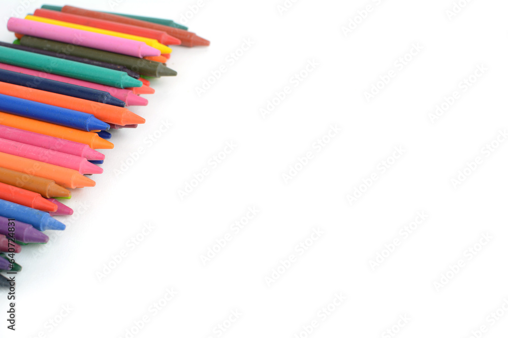 Crayons lined up isolated on white background. Crayons lined up isolated on white background.