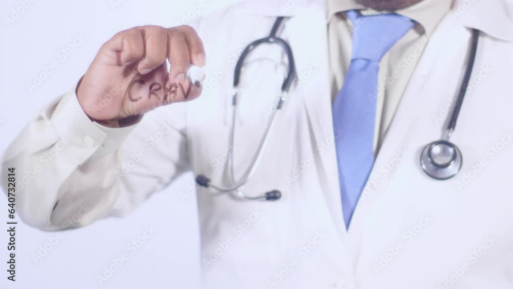 A doctor writes on the screen words Carvings A doctor writes on the screen words Carvings