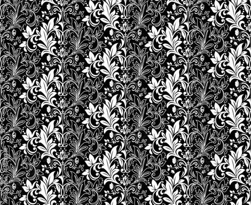 Wallpaper in the style of Baroque. Seamless vector background. White and gray floral ornament. Graphic pattern for fabric, wallpaper, packaging. Ornate Damask flower ornament.