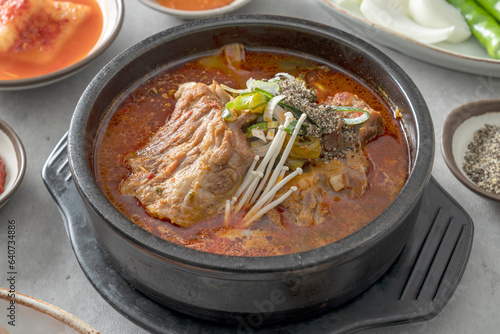 Korean food dish Side dishes, pork rib hangover soup, gopchang hot pot, and gamjatang