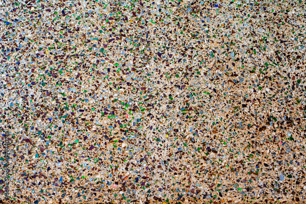 Fototapeta premium Background and texture made from colored stones pebbles and sand.