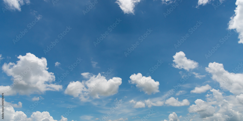 amazing. Blue sky and white clouds float in the sky on a clear day with ...
