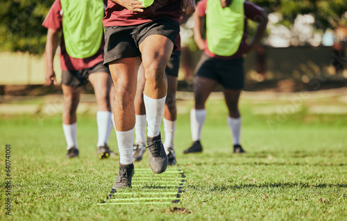 Sports, running and men for rugby training, workout and exercise on grass field for competition. Fitness, teamwork and feet of athletes with equipment outdoors for match practice, challenge and game