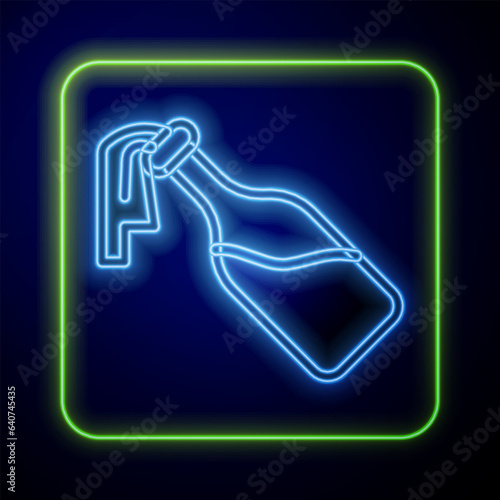 Glowing neon Cocktail molotov icon isolated on blue background. Vector