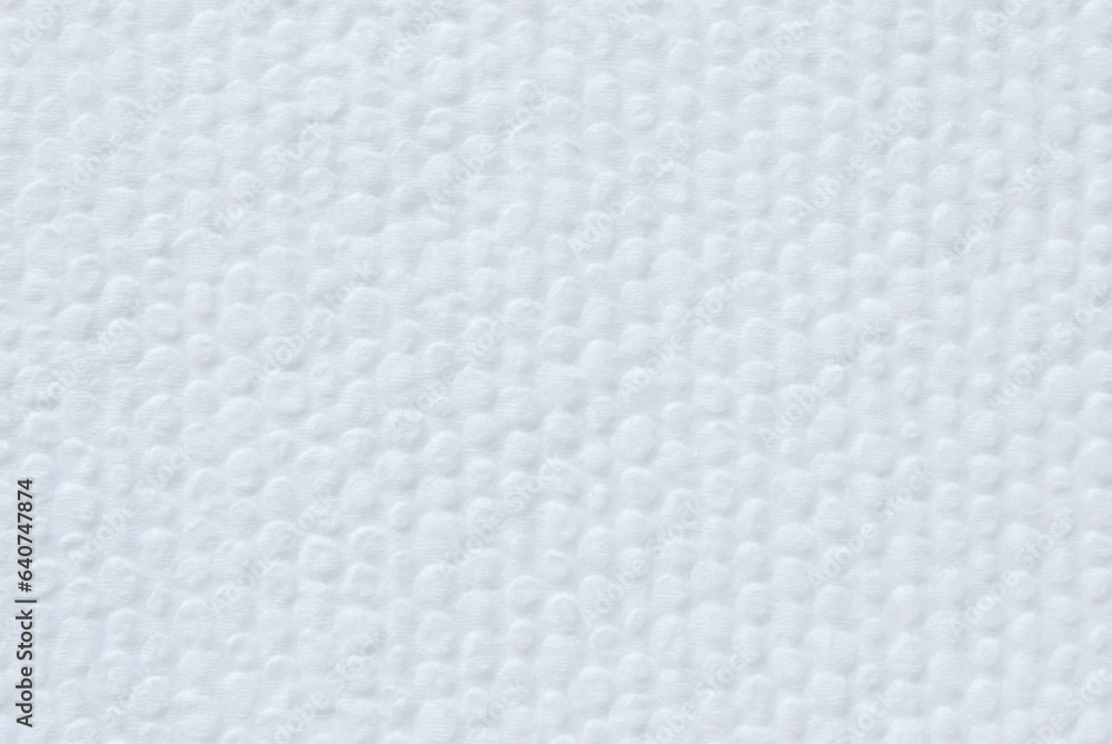 A sheet of clean structured white tissue paper as background
A sheet of clean structured white tissue paper as background