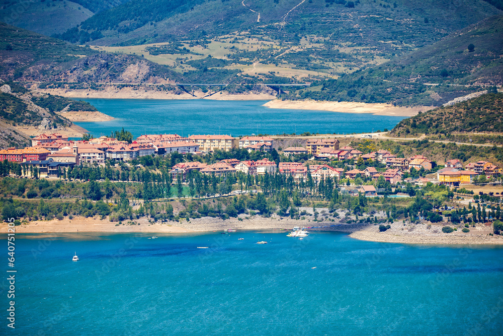 the new village of Riaño with the reservoir and mountains 