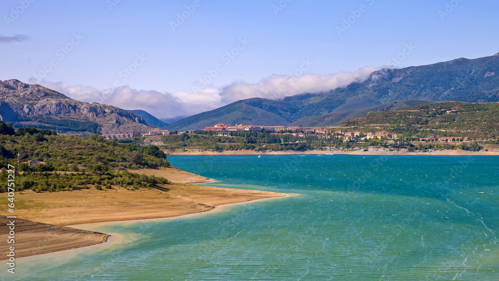 Fototapeta premium the new village of Riaño with the reservoir and mountains 