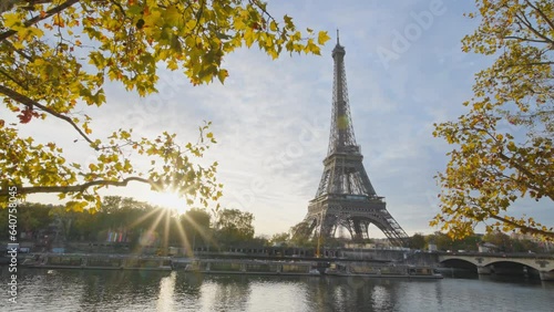 Beautiful view of famous Eiffel Tower one of the most iconic landmarks in France. Paris city center and river Seine at morning sunrise or sunset in autumn. Best travel destinations landmark in Europe.