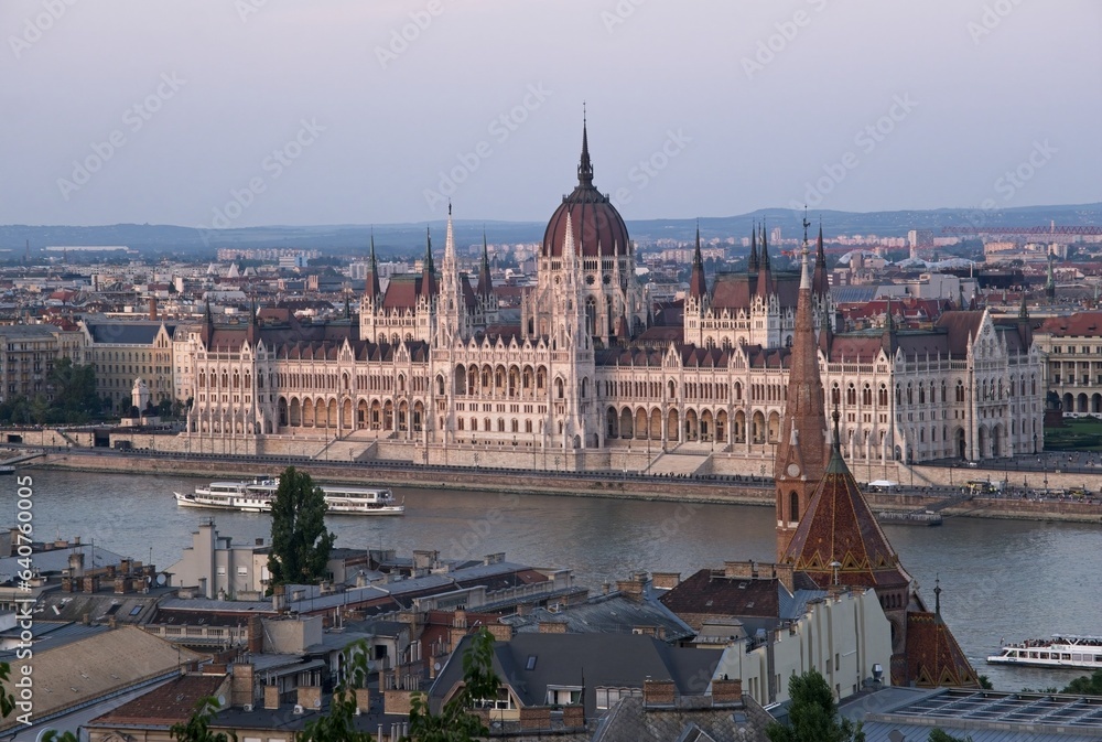 Budapest, Hungary - Aug 19, 2023: View of the Budapest city from the Kilatopont viewpoint in a sunny summer day. Budapest Parliament. Selective focus.
