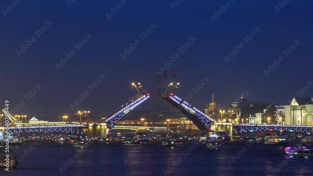 Timelapse captures the mesmerizing scene of Palace Bridge opening, bustling with observing tourists, as Neva River flows at night. A plethora of ships and boats add to the spectacle. Saint-Petersburg