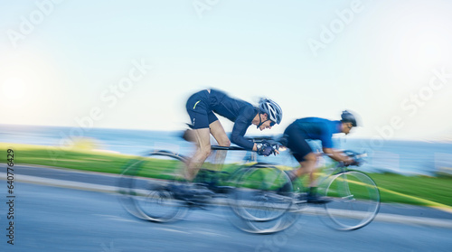 Motion blur, competition and cyclist on bicycle on road in nature with helmet, exercise adventure and speed. Cycling race, challenge and men with bike for fast workout, training motivation or energy.