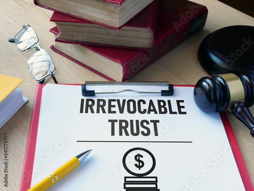 Obraz na plátně Irrevocable trust document is shown using the text