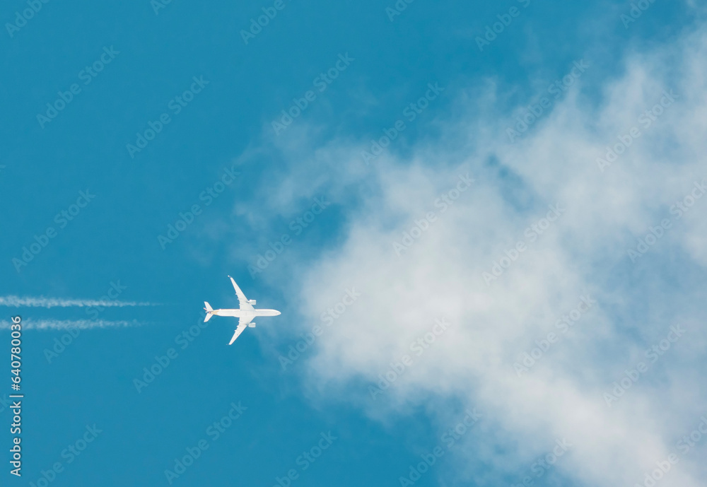 High altitude passenger plane. The plane enters the clouds. High altitude passenger plane. The plane enters the clouds.