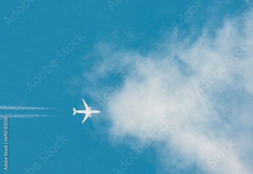 High altitude passenger plane. The plane enters the clouds.