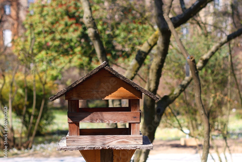 Wooden birdhouse in the park. Selective focus. © jelena990