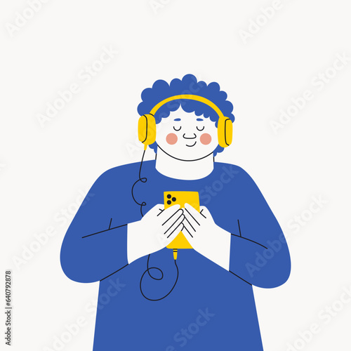 Teenager boy in headphones listens to music, podcast or audiobook on his smartphone. Vector trendy illustration.