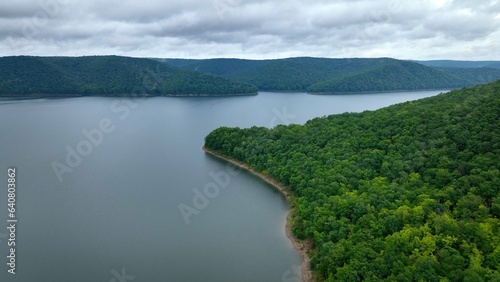 Allegheny river flows through green mountains in landscape nature area in National Forest in America wilderness
