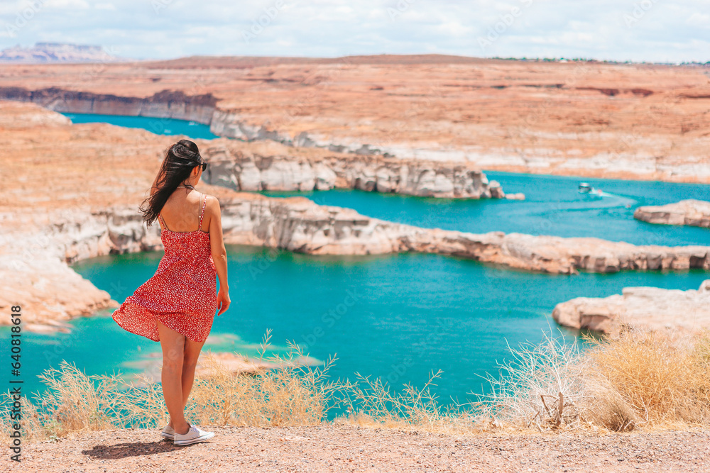 Young woman enjoying the view Lake Powell, Glen Canyon National Recreation Area Young woman enjoying the view Lake Powell, Glen Canyon National Recreation Area