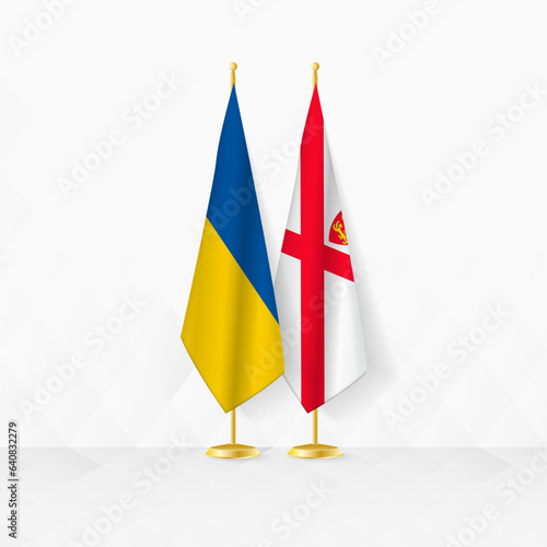 Ukraine and Jersey flags on flag stand, illustration for diplomacy and other meeting between Ukraine and Jersey.