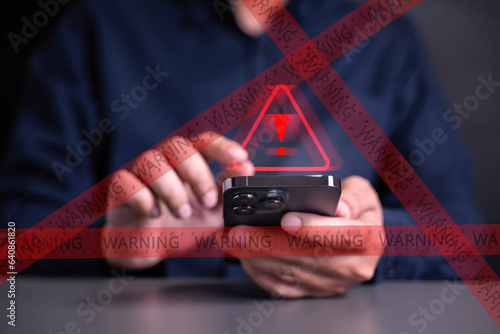 People with warning notification and spam message icon on laptop. photo