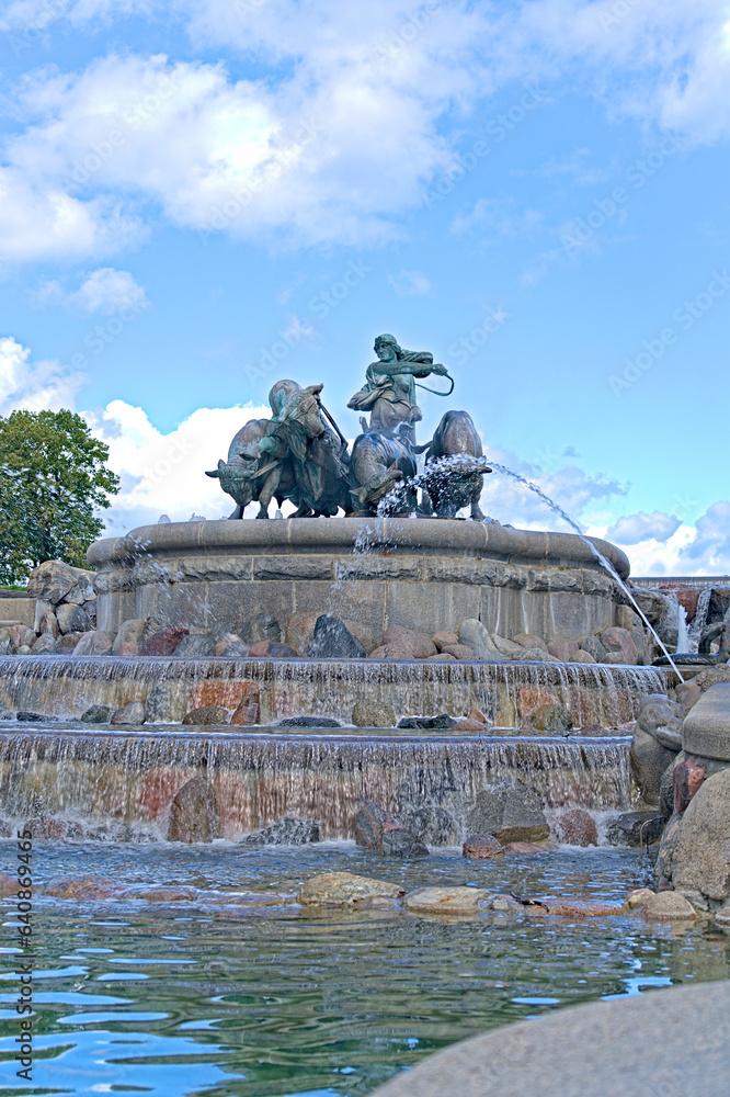 Gefion Fountain famous landmark in Copenhagen, Norse goddess Gefjon on a plow pulled by oxen, in Nordre Toldbod Copenhagen