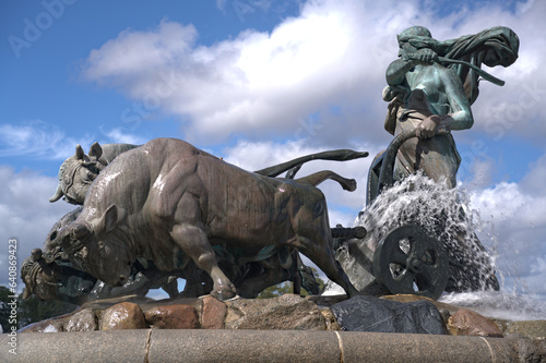 Gefion Fountain famous landmark in Copenhagen, Norse goddess Gefjon on a plow pulled by oxen, in Nordre Toldbod Copenhagen