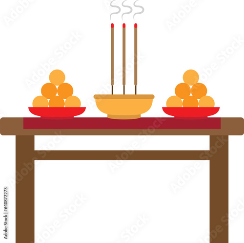 The worshippers offer food and incense sticks for the Gods at the temple.