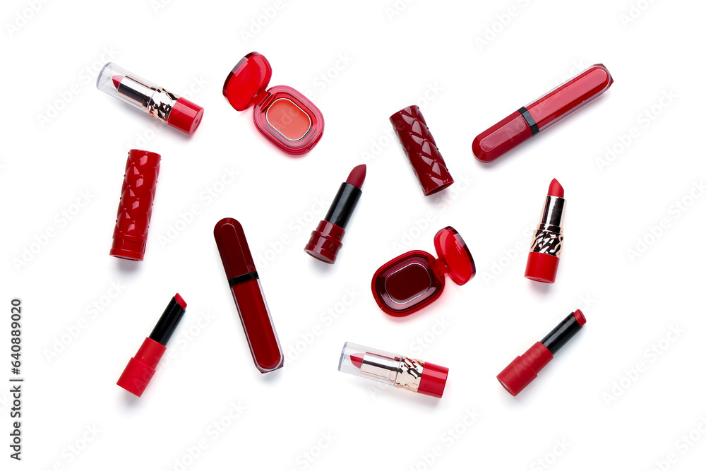 Set of different red lipsticks on white background Set of different red lipsticks on white background