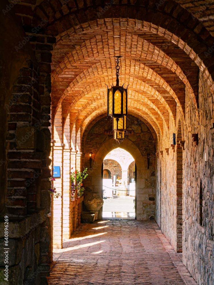 Sunny exterior view of a hall in Castello di Amorosa