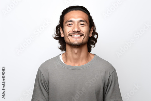 Picture of man with long hair and genuine smile on his face. Suitable for various uses. © vefimov